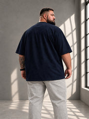 Rückansicht des marineblauen LR TEX Oversize T-Shirts mit extra langem, abgerundetem Saum